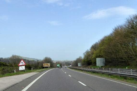 A38 closed for hours after horrific crash leaves biker dead