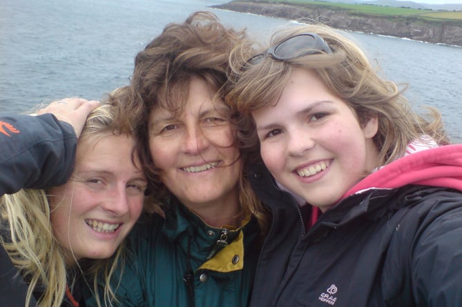 Cathy Meredith with her daughters Sarah (right) and Jess