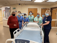 Pals group donate new hospital bed
