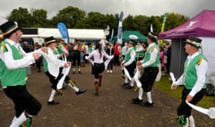 The Morris men are out and dancing all about 