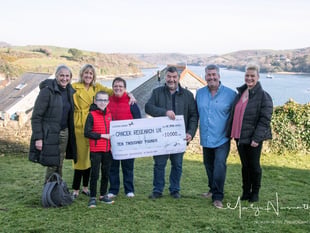 Rotary club presents cheque to Cancer Research UK
