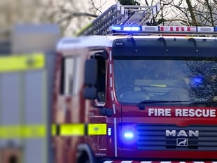 Car fire spreads to house