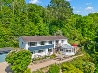 Estuary-view home for sale comes with its own woodlands and stream