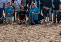Beach clean prompts talks about pollution