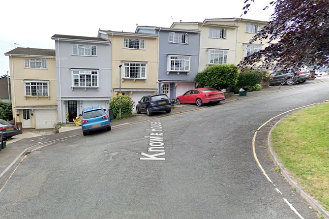 A Google Street View of Knowle House Close and parked vehicles
