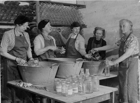 Around 1939 - 1945 Women washing jam jars, all WVS.Second World War, during the evacuation of the Slapton area.