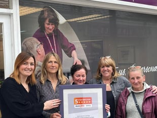 Care company celebrates triple success