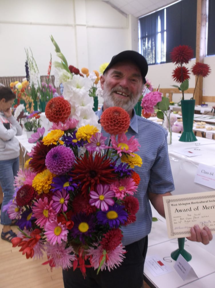 Bob Gould with his spectacular bowl of garden flowers