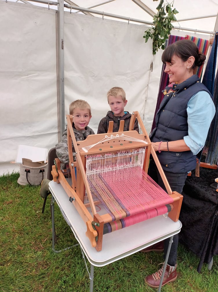 Albie 5, Harry Davis 8 & Kelly showing how to weave