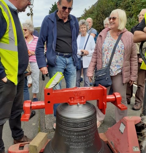 Villagers welcome their church bells