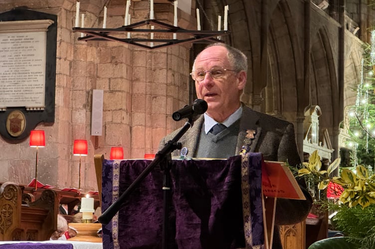 James Steer, chairman, Devon Association of Ringers, read a lesson at the Devon Bellringers’ Carol Service.  AQ 0007