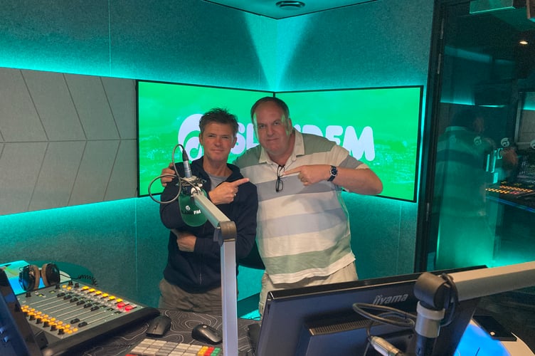 Reporter Richard Harding (right) with Island FM's longest-serving presenter Carl Ward