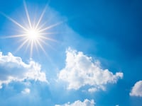 Sunny conditions with possible showers, partly cloudy tomorrow