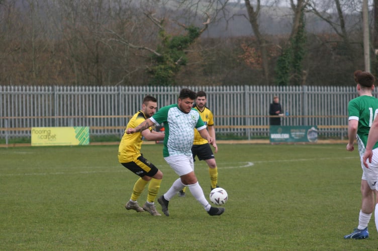 Ivybridge Town 2s player controls under pressure