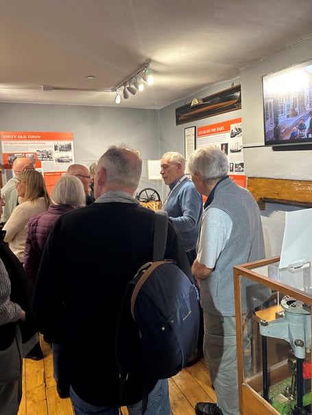 Chair Mike Rowley talks to the visitors