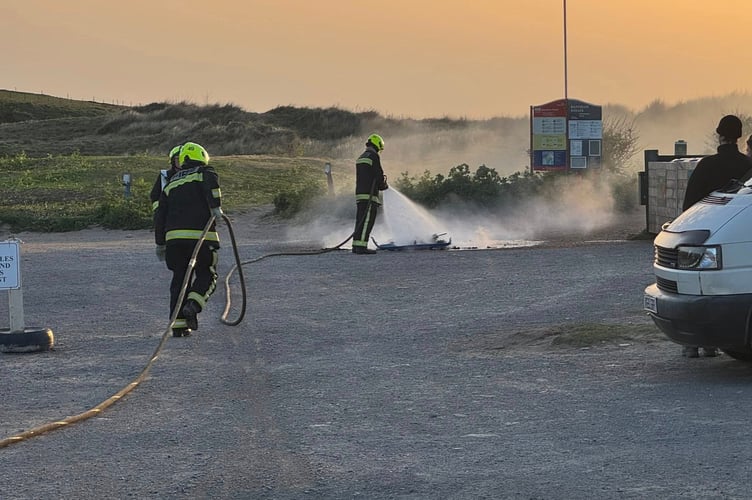 The crew extinguishes the BBQ fire at Bantham