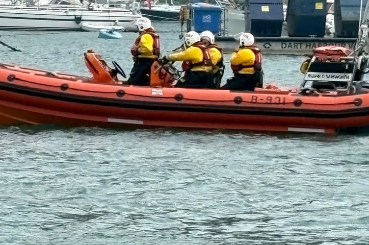 Dart RNLI searces the area with a RIB
