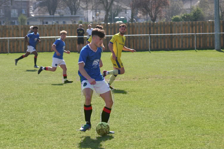 Tom Lobb on the ball for Newton Abbot Spurs