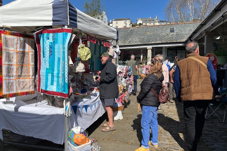 The weather stayed bright and sunny bringing visitors to the market