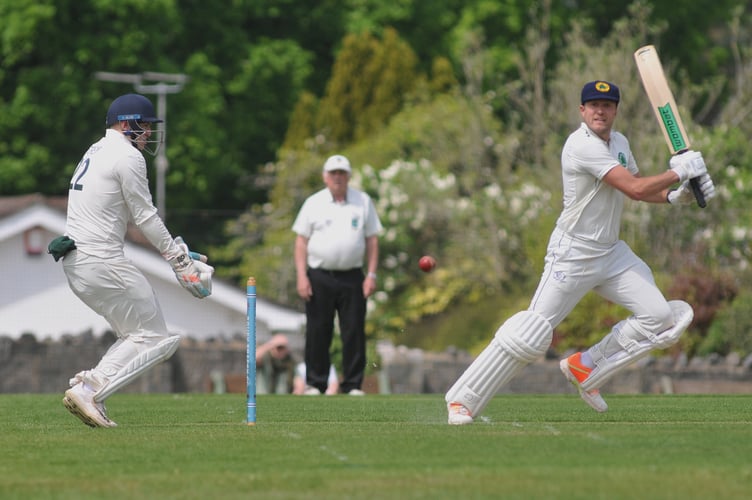 Devon Cricket League B Division. Bovey Tracey 2nd XI versus Ivybridge 1st XI. Ivybridge opener Josh Zimmerman and Bovey 'keeper Joseph Forey