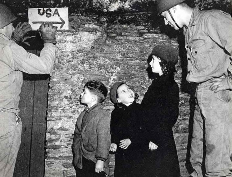 American soldiers talking with children in South Hams