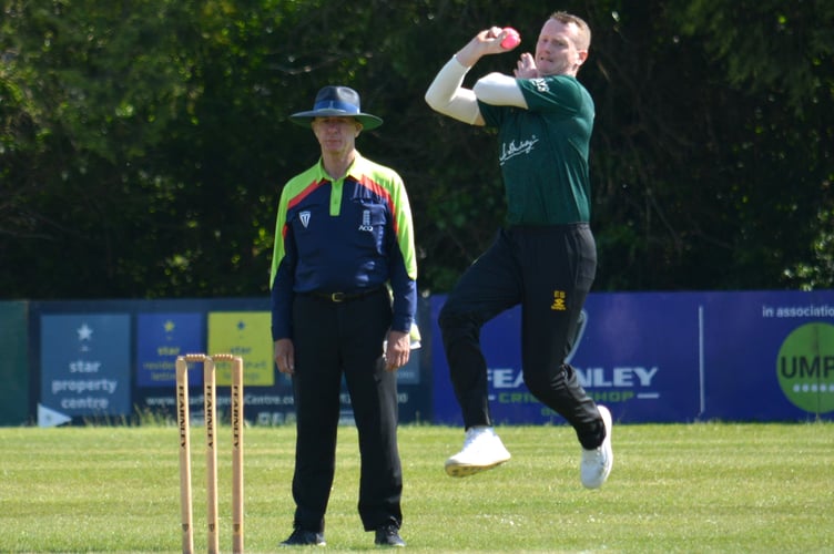 Cornwood captain Elliott Staddon leaps into his delivery stride while bowling the opening spell against Exeter