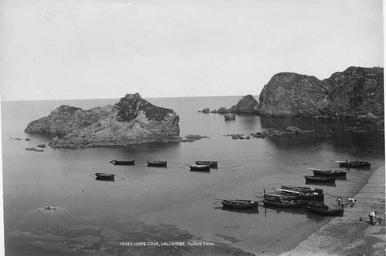 Small boats moored by the beach at Hope Cove