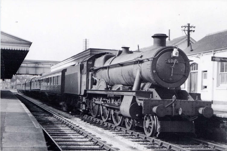 Engine number 6965 'Thirlestaine Hall' with a train from Kingswear at Paignton 1960