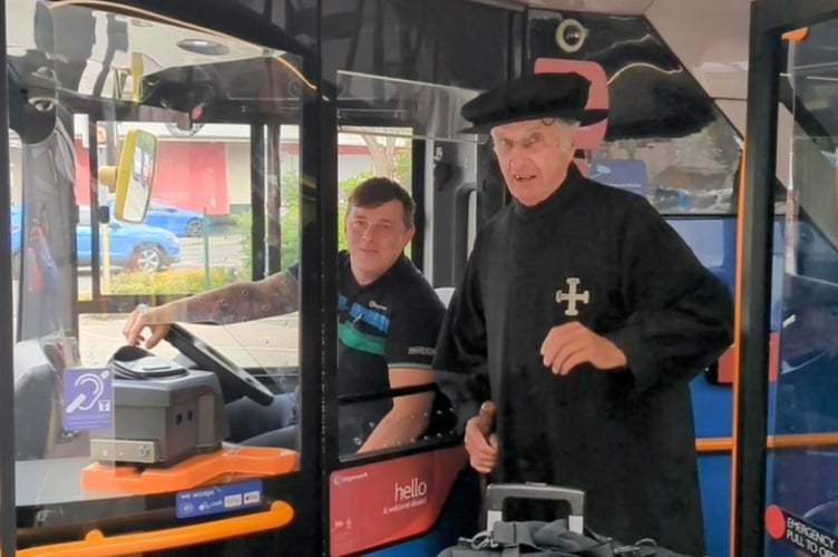 Brother John boards a Stagecoach bus with his luggage.