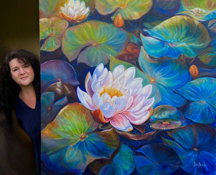 Anita Nowinska with her big waterlily flower painting- Fortitude.