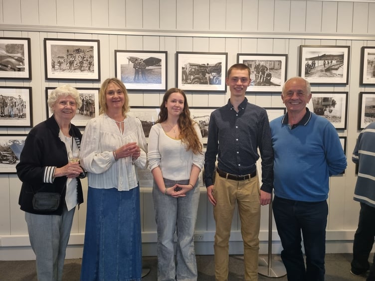 Students Tilly Cross and Harley Allen. Museum curator Kathy Courage and two volunteers