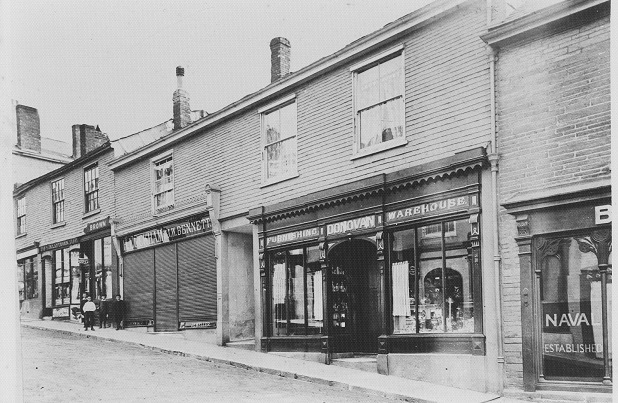 Donovans Furnishing Warehouse shop front, 49 Fore Street, Kingsbridge. Formerly the Post Office premises.   Also H. Luckham, J.W. Bennett, Brown, J.R. Lapthorn