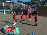 Local cricket club makes donation to Harbertonford Primary School