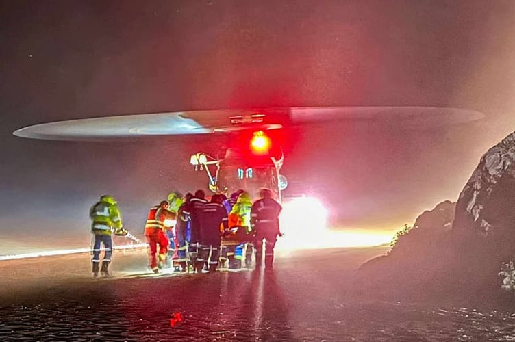The casualty is prepared for transportation by helicopter