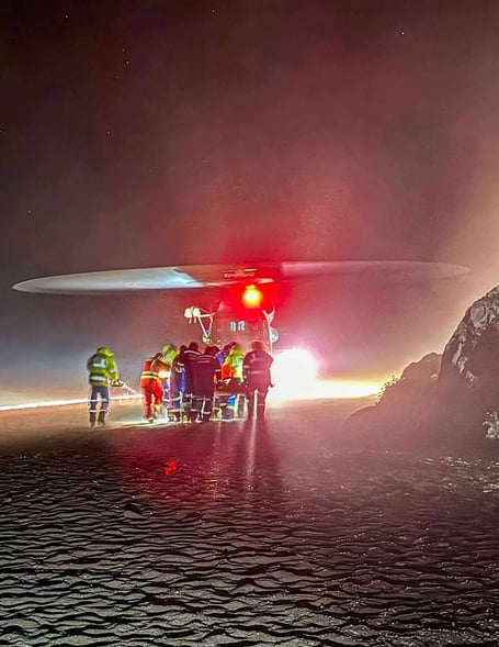 The casualty is prepared for transportation by helicopter