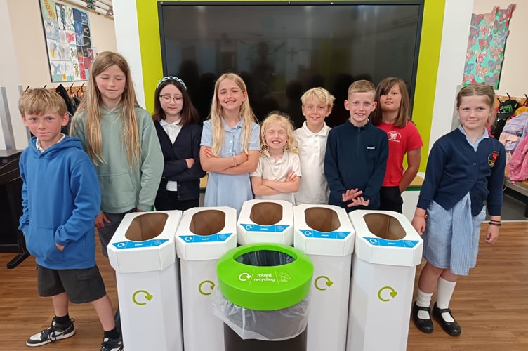 The pupil parliament with the recycling bins