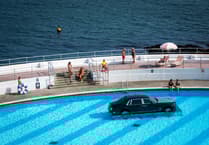 Rolls Royce lowered into swimming pool was 'in honour of’ rock legend