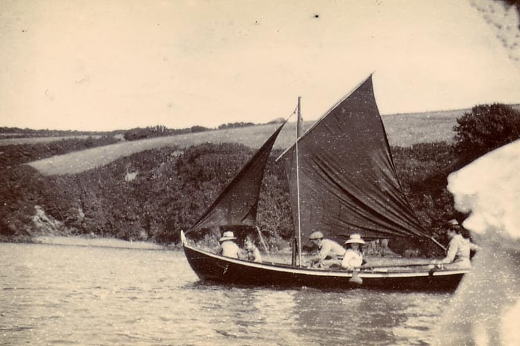 People and boat on Kingsbridge, Salcombe Estuary