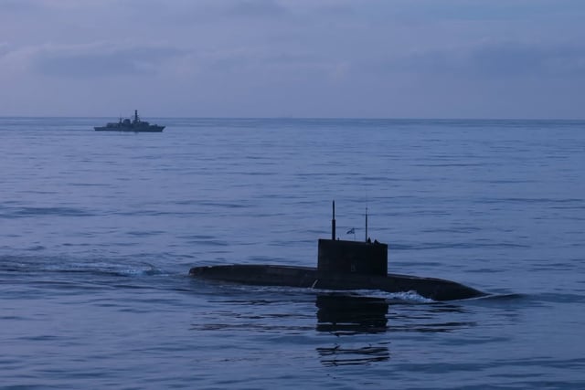 Royal Navy frigate HMS Iron Duke monitors Russian submarine
