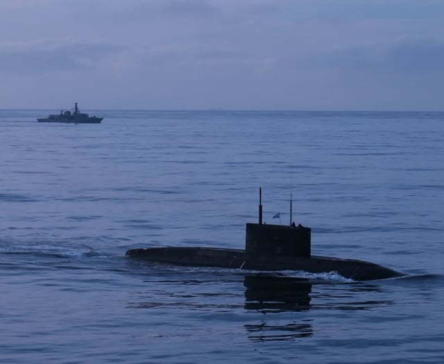 Royal Navy frigate HMS Iron Duke monitors Russian submarine