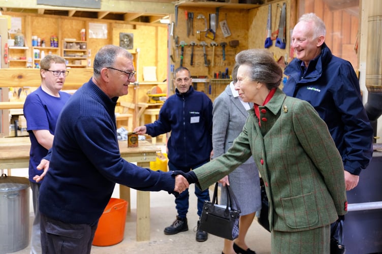 Princess Anne meeting staff and trainees at the Wood Workshop.