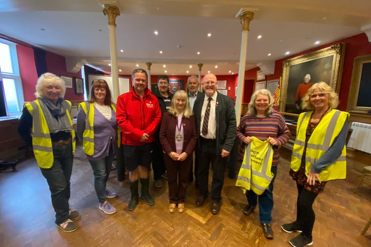 From left: members of the Dartmouth Green Partnership, Jonathan Scott Tucker, Michael Sutton Cellars, Dartmouth Mayor Cllr Andrea Cates, Carl Farrell, Peter Adolphus of River Dart Rotary, and more members of the Dartmouth Green Partnership.
