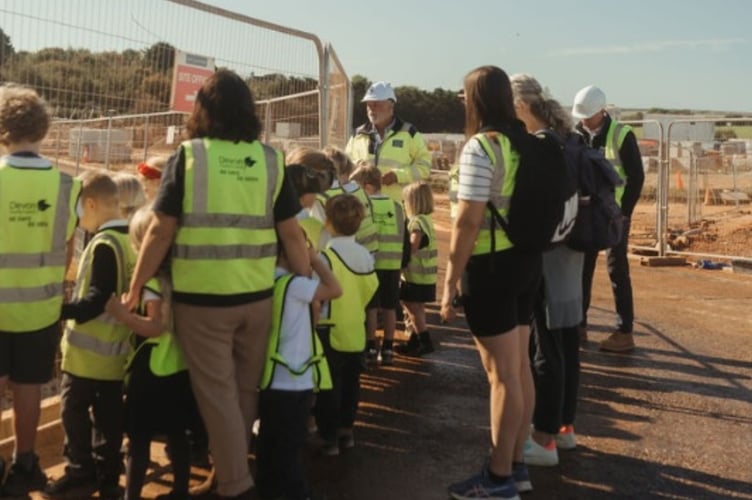 Newton Ferrers Church of England school pupils visit new construction project, led by Coln Homes
