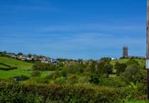 Car flips at Ugborough driver rescued
