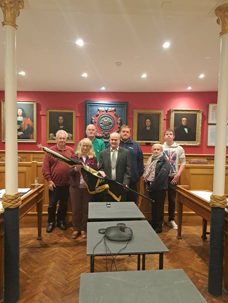 L to R back row: Former Brigade members Malcolm Matthews, Cllr Nick Davies, Ashley Winsor, Cadet Oliver Caple,  L to R Front row: Mayor Cllr Andrea Cates, David Drury & former brigade member Gemma Caple