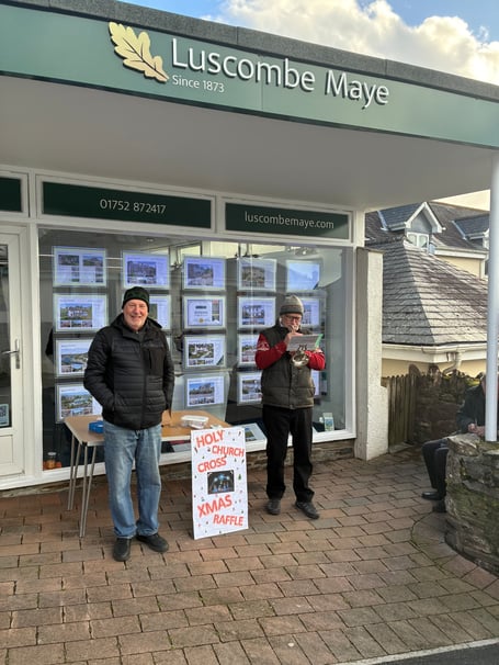 Phil Davis and Peter Lane sell raffle tickets