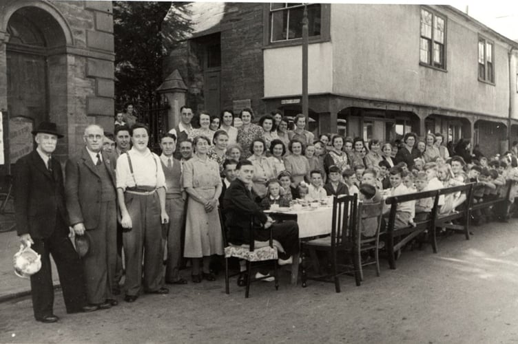 Children's party on VE day 1945, in front of the Town Hall in Fore St, Kingsbridge 