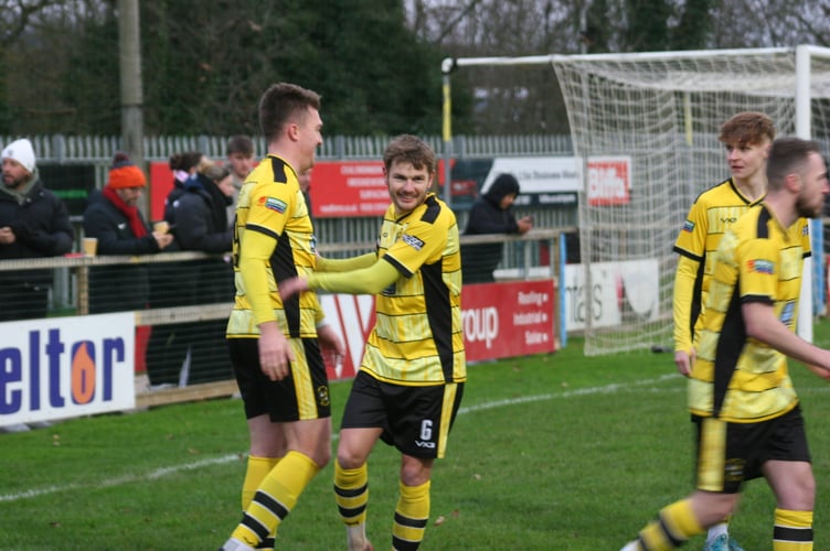 Ryan Bush celebrates his opener against Ivybridge.