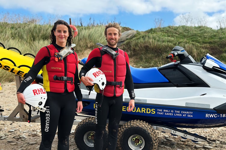 RNLI Lifeguards Daisy Womack and Matt Liptrott at Bantham beach, Devon