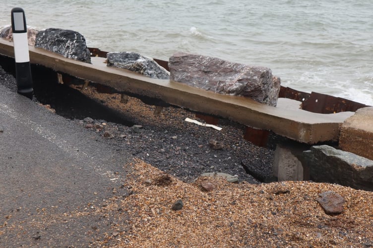 The sea wall coming away from the road 
